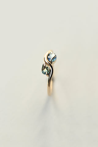 PAIRED OVAL AND PEAR CUT SAPPHIRE RING