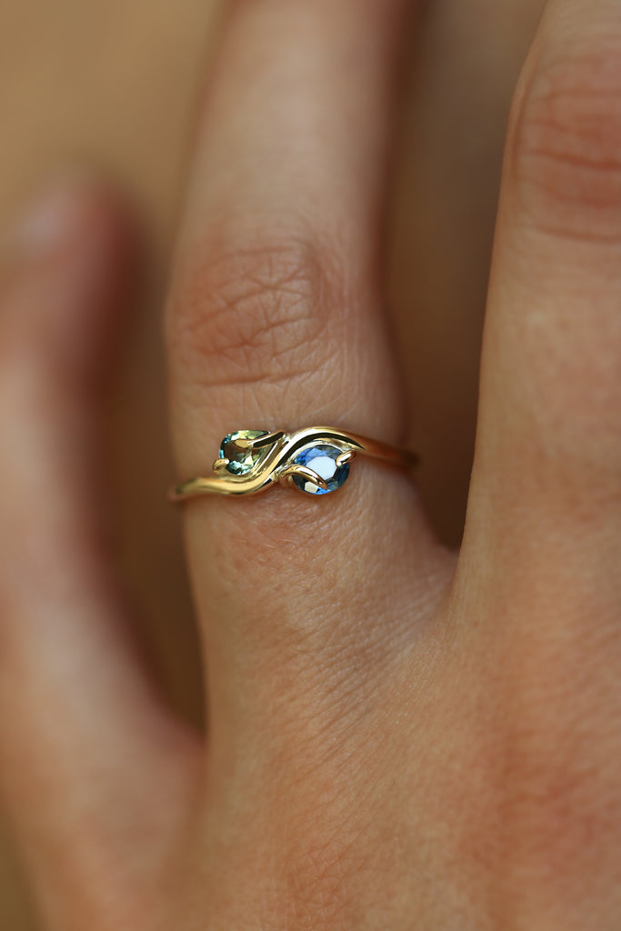 PAIRED OVAL AND PEAR CUT SAPPHIRE RING